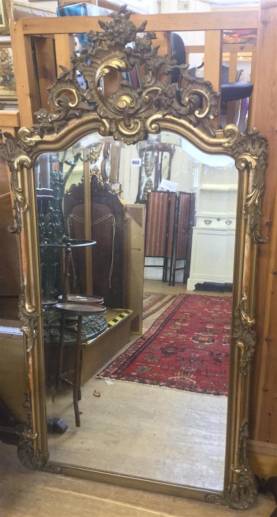 Ornate gilt wall mirror